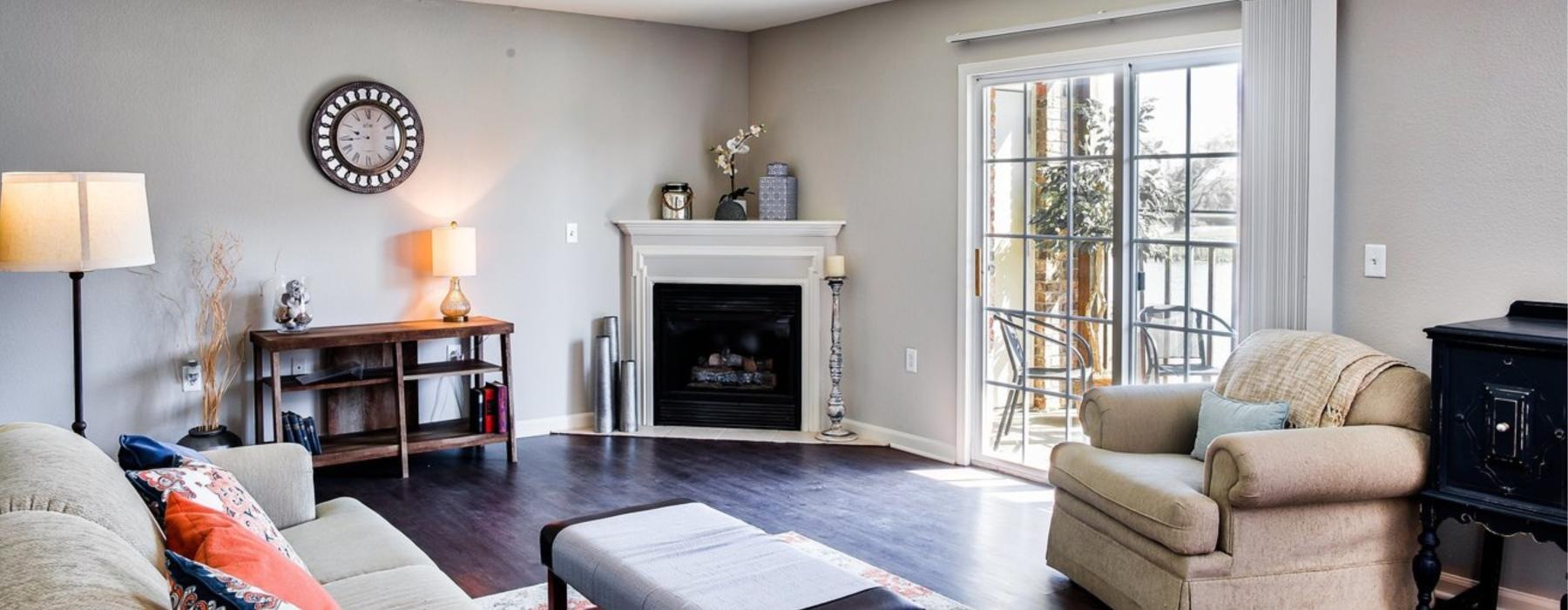 a living room with a fireplace