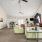 Clubhouse with furniture and a ceiling fan