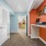 Business center with orange walls and computers